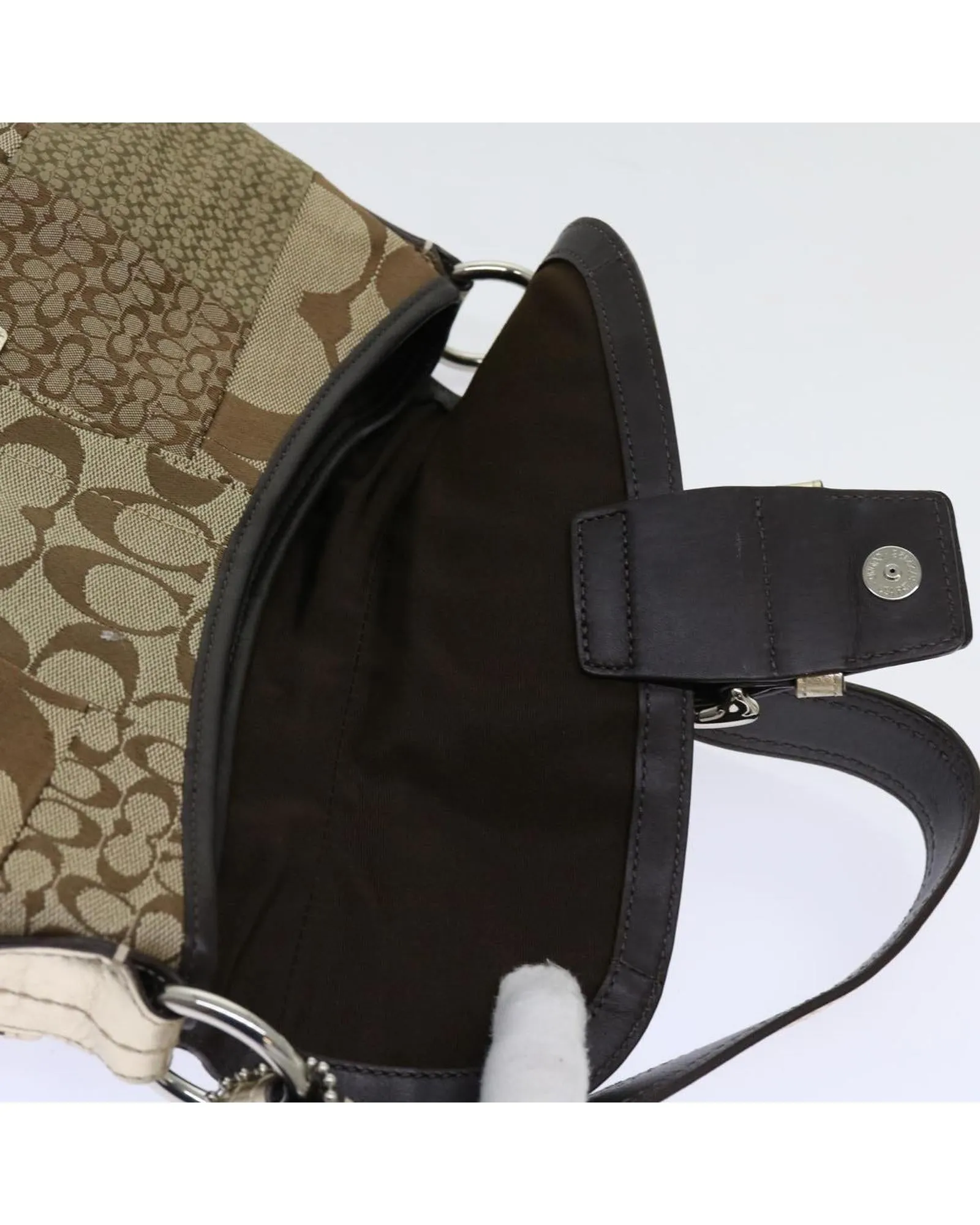 Beige Canvas Shoulder Bag with Leather Accents and Charm