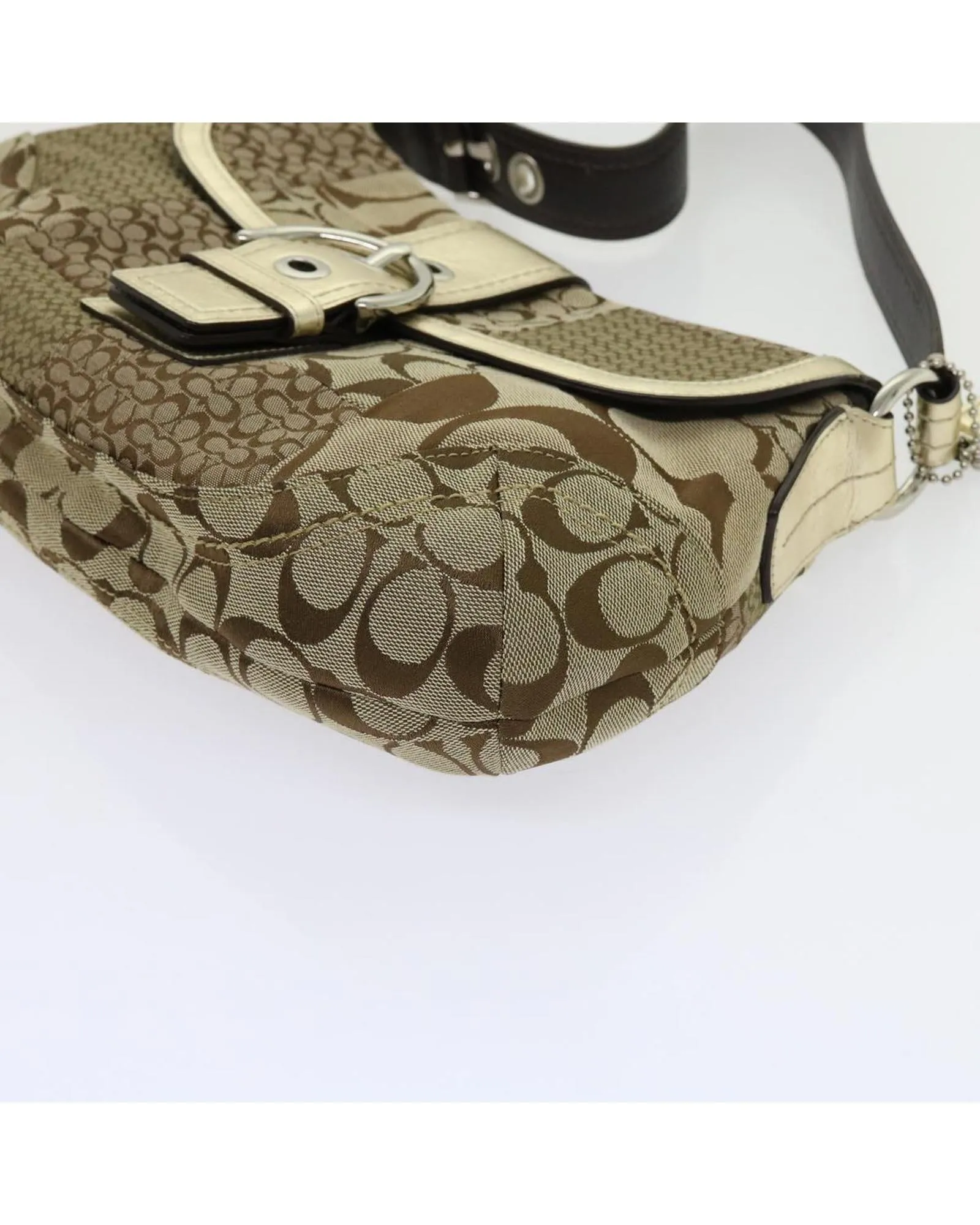Beige Canvas Shoulder Bag with Leather Accents and Charm